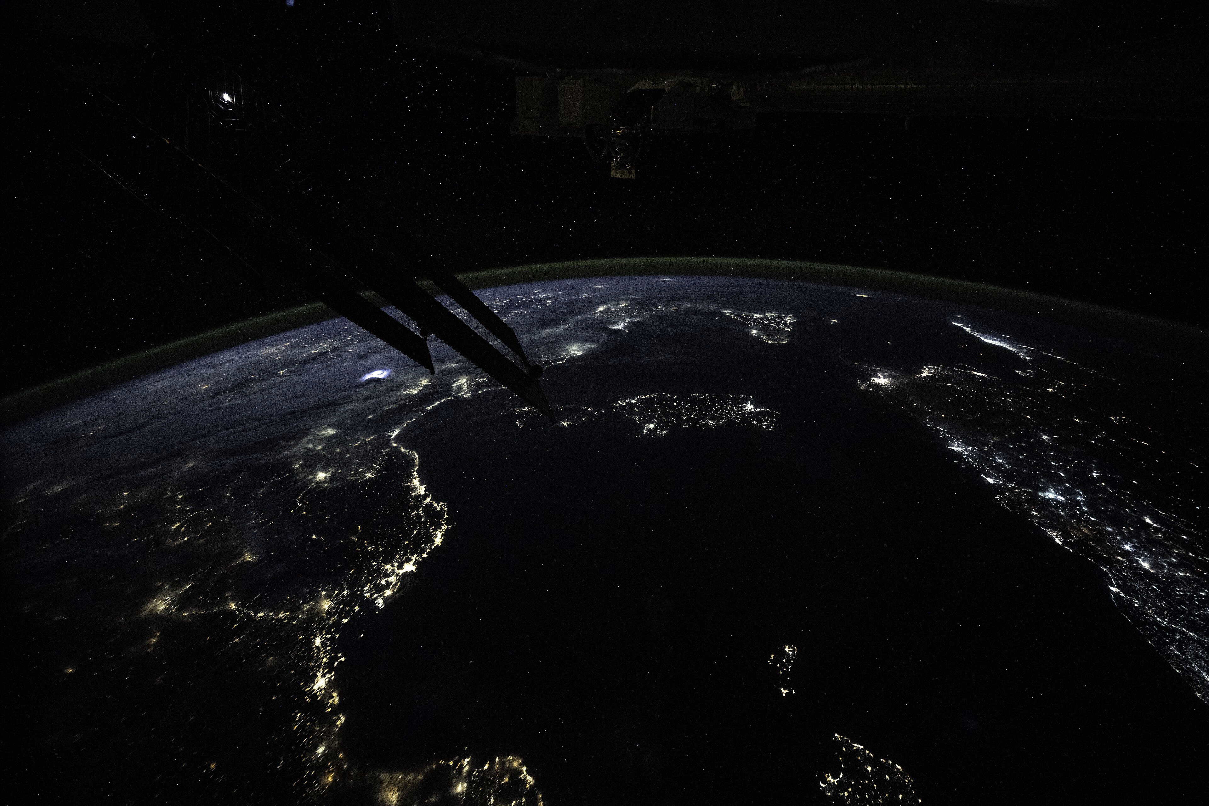 City lights along the Mediterranean at night, seen from orbit